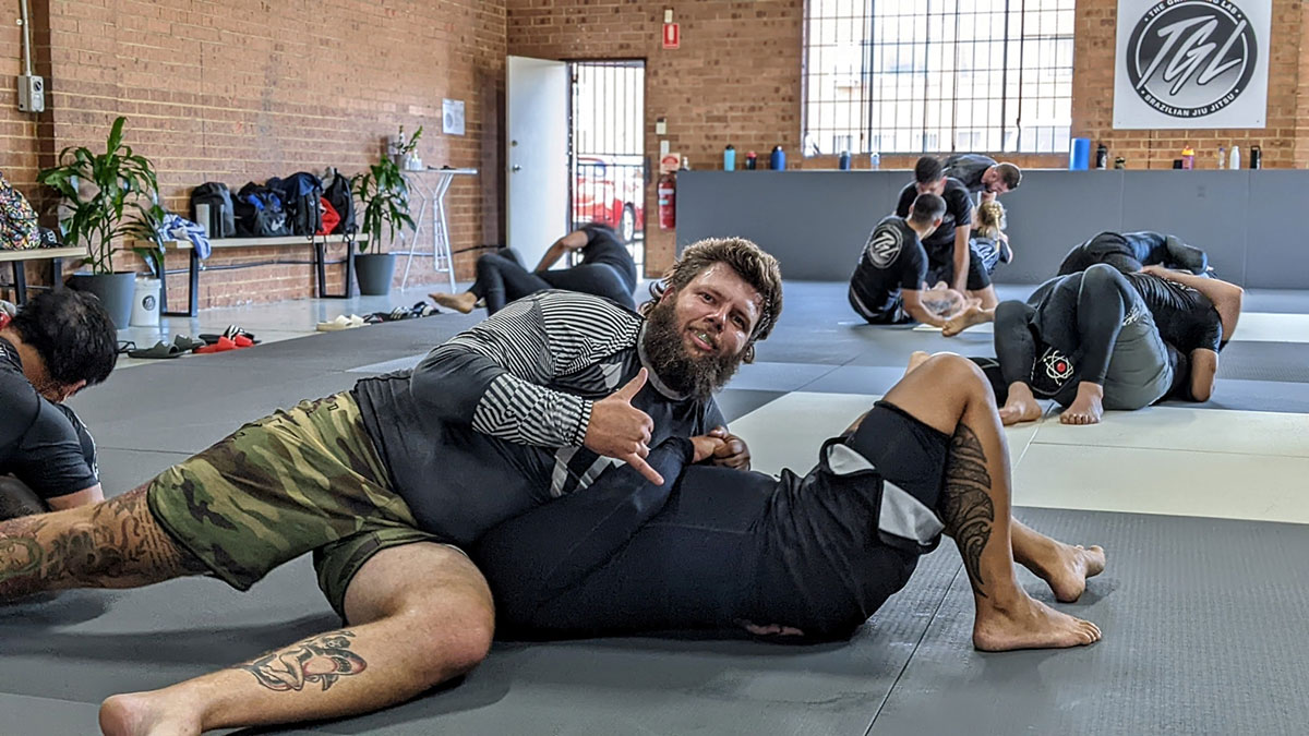 the grappling lab student practicing bjj technique